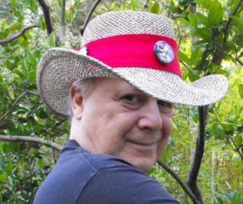 Photo of E.J. Gold wearing Astral Travel Safari Hat with red band
